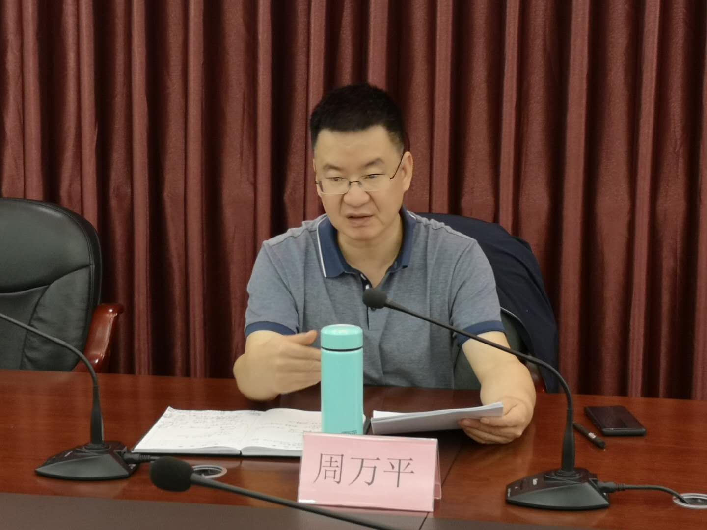 图片：市残联党组书记、理事长周万平提工作要求